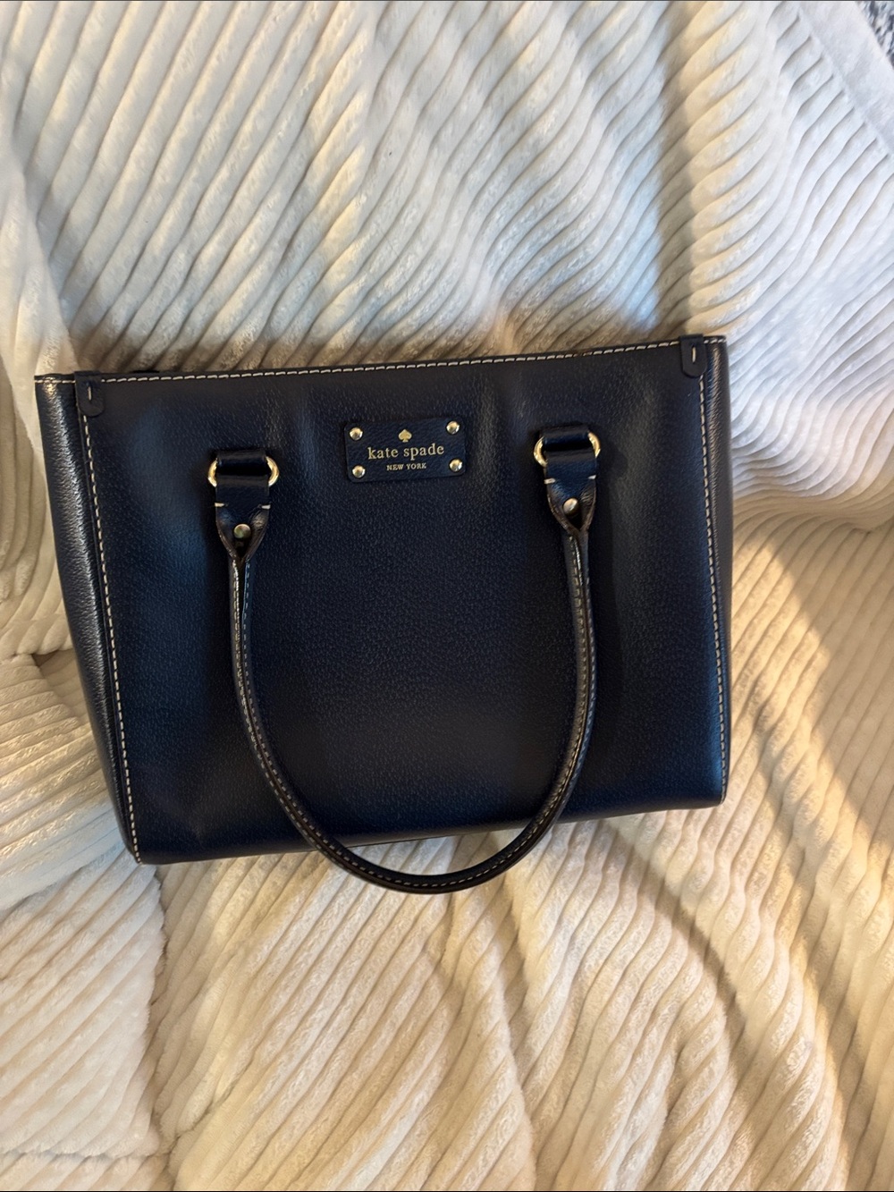 kate spade navy pebbled leather satchel with gold accents